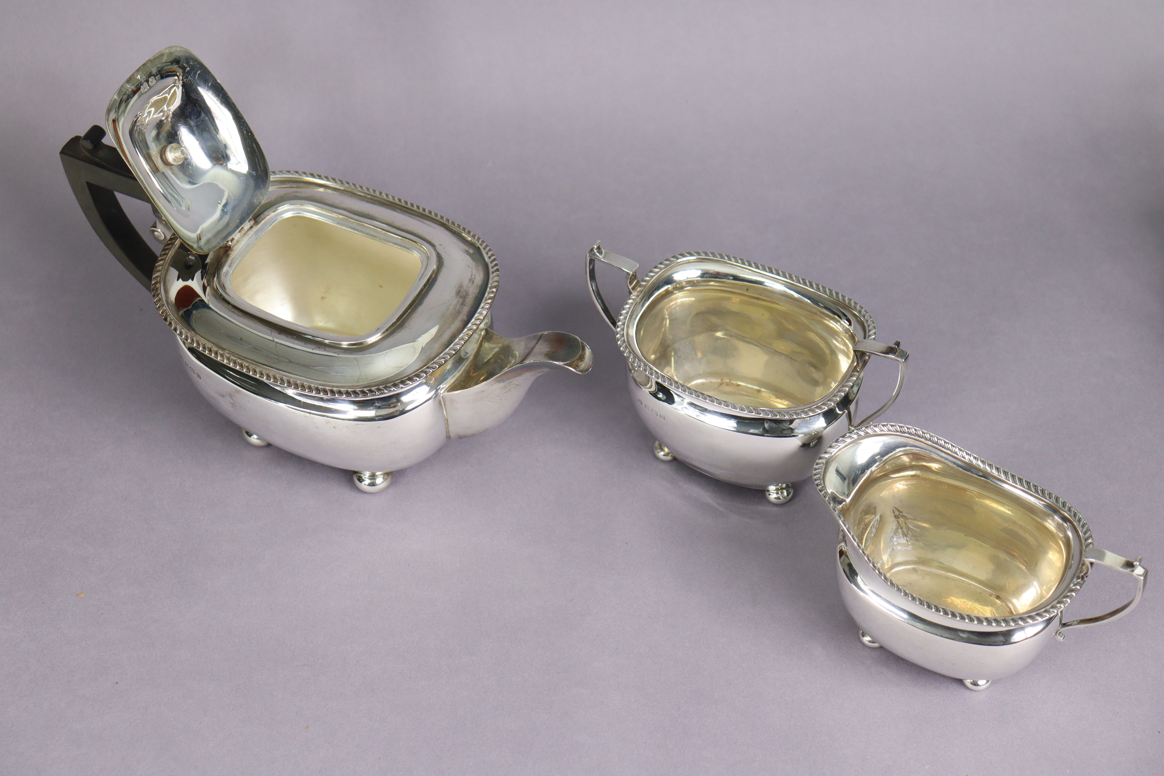 A George VI silver three-piece tea service in the regency style, of compressed oblong form with - Image 4 of 4