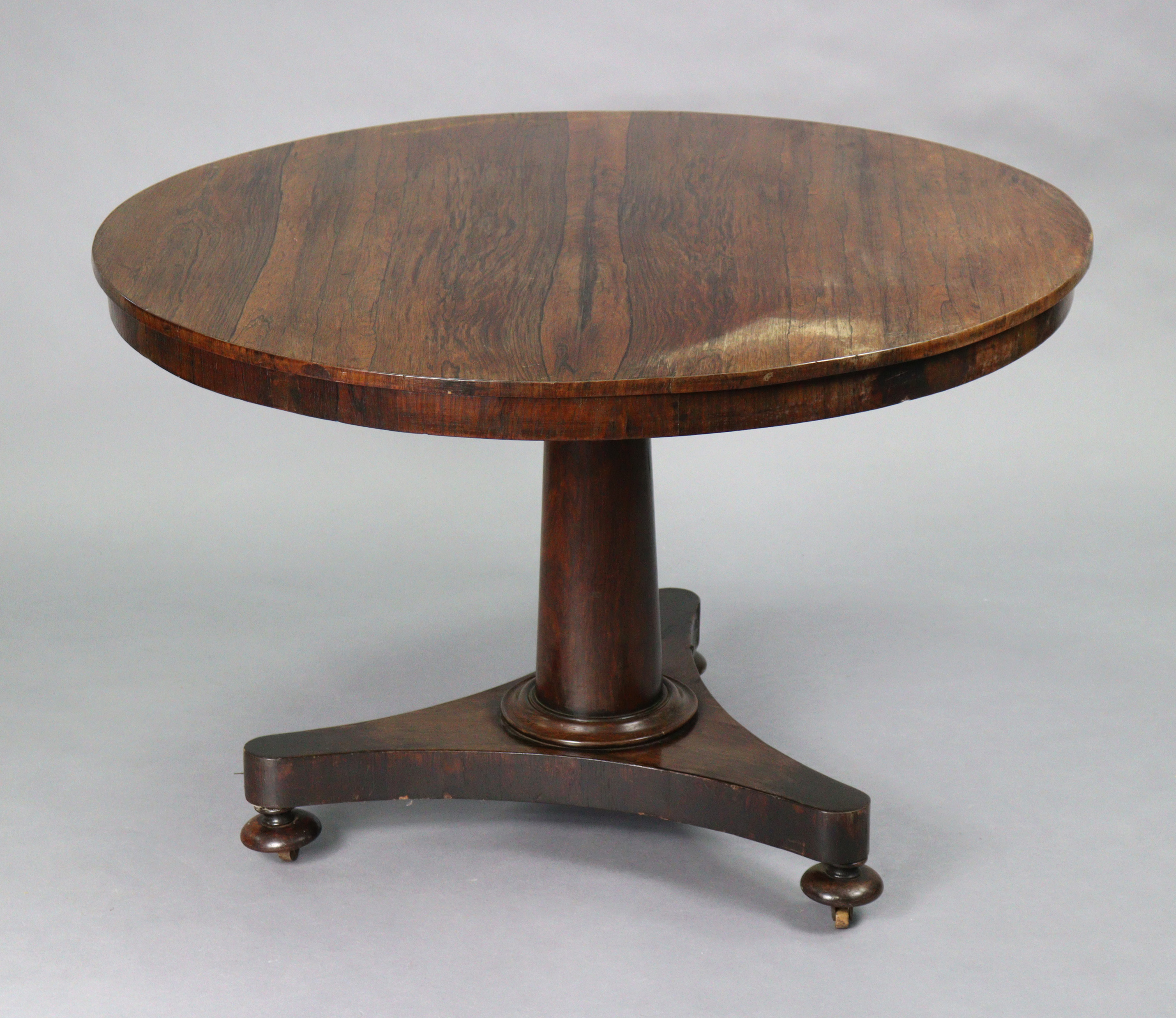 An early Victorian rosewood loo table with circular tilt-top, on tapered centre column & triform - Image 2 of 6