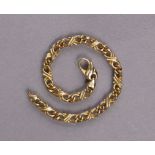 A 9ct gold flexible bracelet of criss-cross links, 7½” long. (14g)