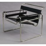 A 20th century ‘WASSILLY’ ARMCHAIR, after the design by Marcel Breuer, with black strap arms &