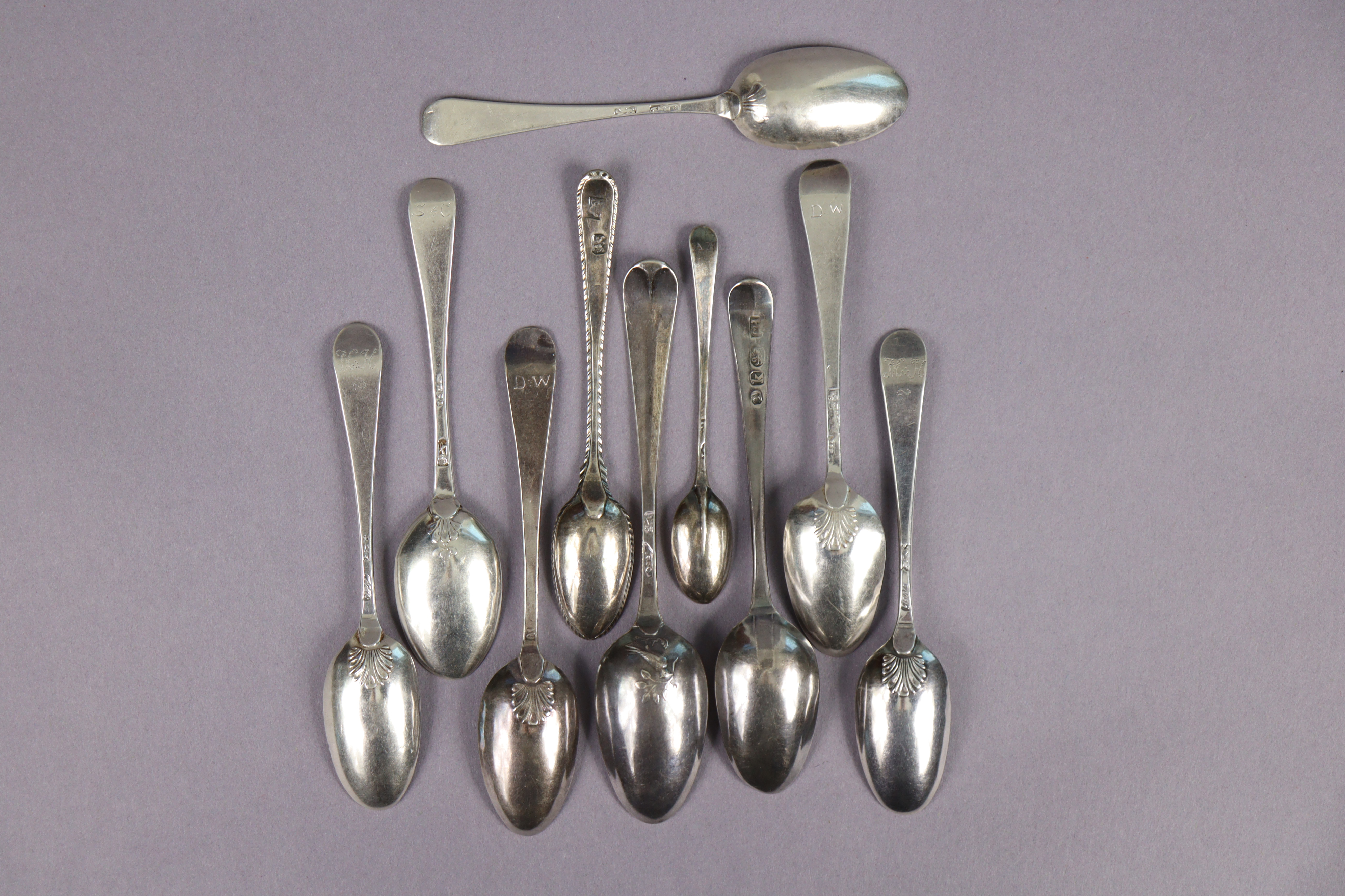 A group of nine 18th century silver teaspoons including a picture-back spoon, six shell-back spoons; - Image 2 of 2