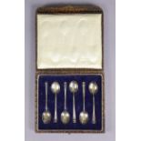 A set of six silver coffee spoons with turn-over terminals, Birmingham 1926 by Hukin & Heath, in