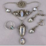 An Art Deco moonstone necklace with white metal mounts; a similar brooch; pair ditto heart-shaped