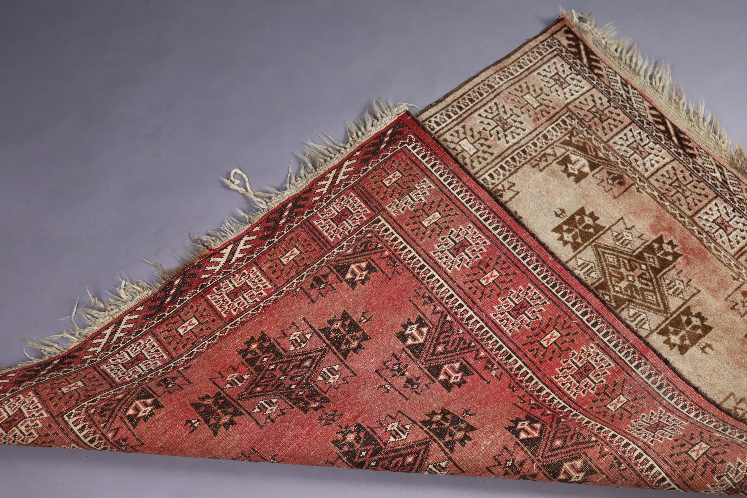 A small Bokhara rug of madder ground, central row of four lozenges within multiple - Image 2 of 2