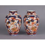 A pair of Japanese Fukugawa/Koransha Imari ovoid vases with all-over floral decoration in deep blue,