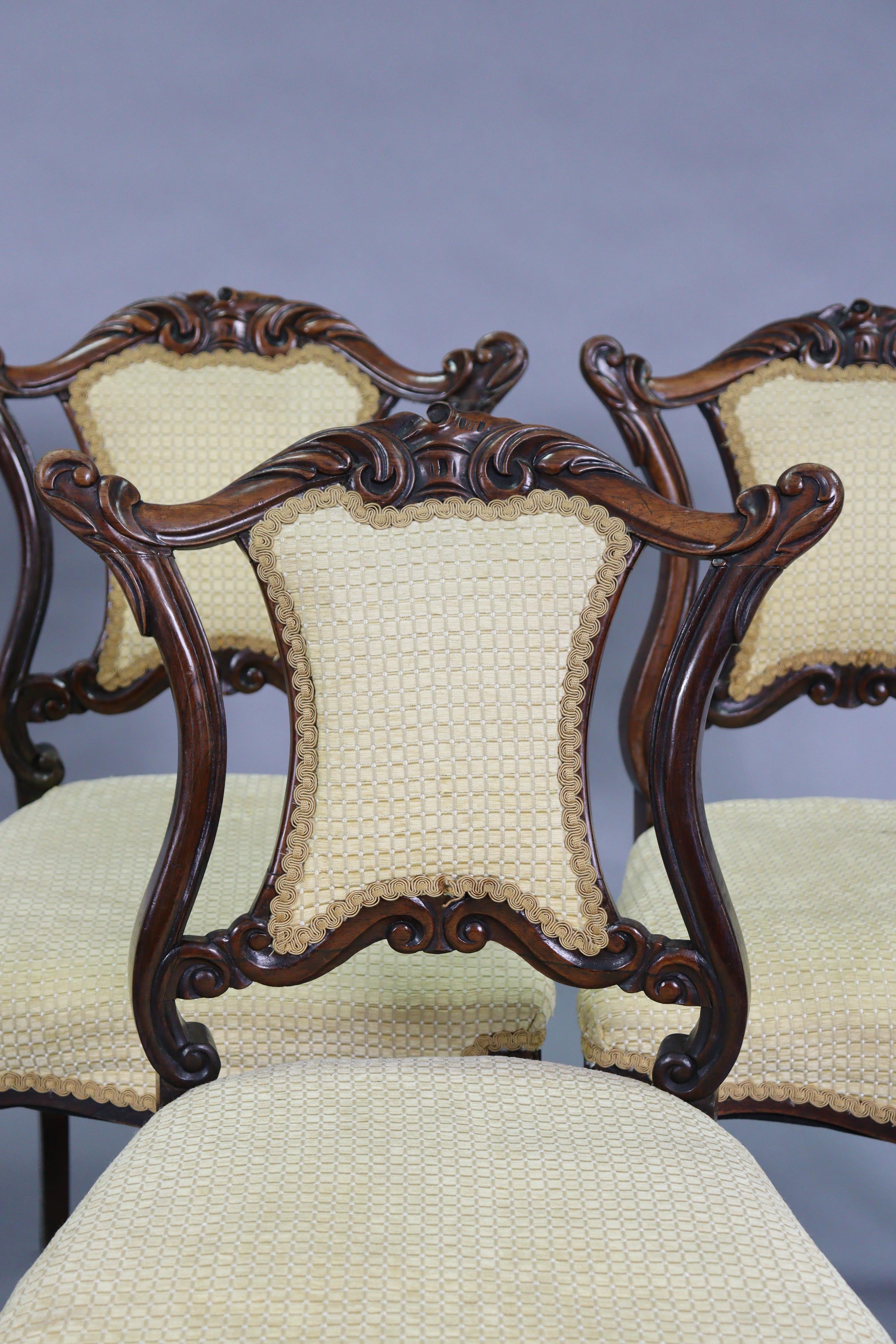 A set of six Victorian rosewood dining chairs with shaped & carved centre rails to the open backs, - Image 2 of 3