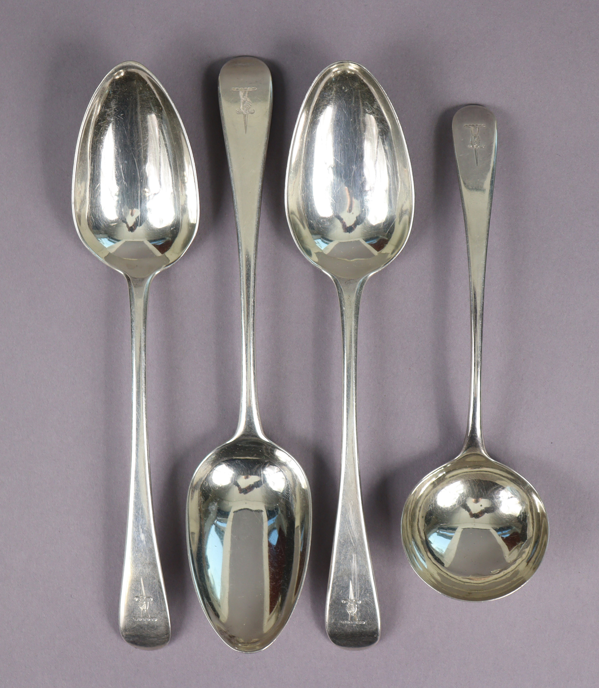 Three George III silver Old English table spoons, London 1798 by Wm Eley & Wm Fearn; & a ditto sauce