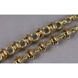 AN 18ct GOLD NECKLACE of circular links with pairs of loose links in between, 18½” long. (33g)