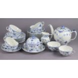 A Royal Copenhagen blue fluted half lace (pattern 525) 27-piece tea service, comprising: a teapot,