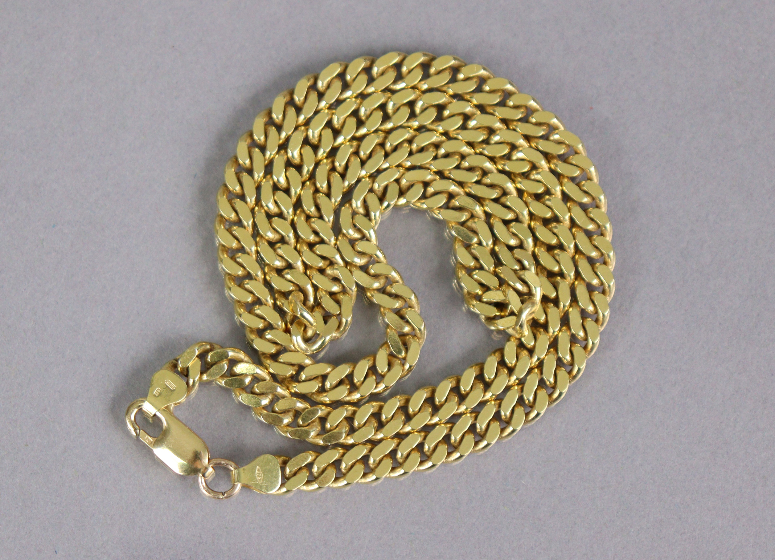 A 9ct gold chain necklace of flattened curb links, 17½” long. (30.8g) - Image 2 of 2