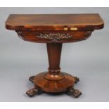 A William IV rosewood card table with rounded corners to the rectangular fold-over top, inset