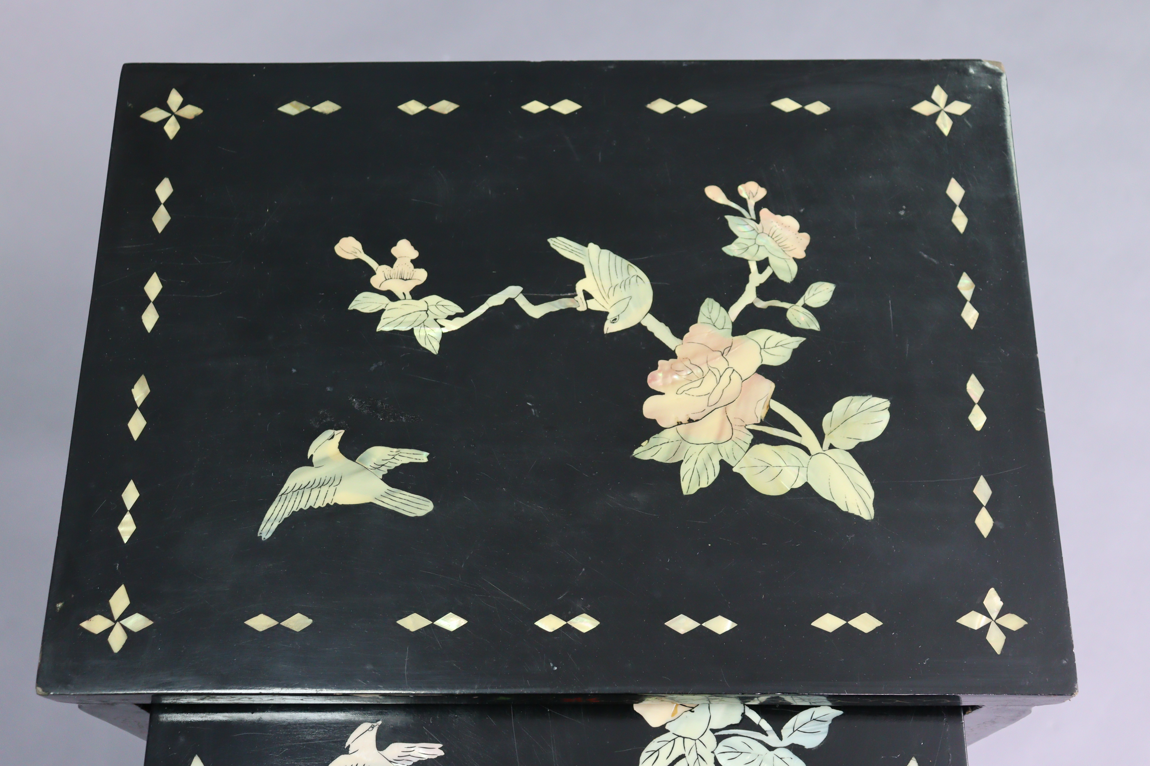 A nest of four Chinese lacquered occasional tables, each with inlaid mother-of-pearl & painted - Image 2 of 6