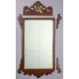 A George III mahogany rectangular wall mirror in fret-carved frame with gilt Ho-ho bird & inner