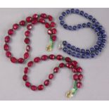 A necklace of facetted ruby beads, 16¾”; another, 15¾”; & another of round sapphire beads, 18¼”.