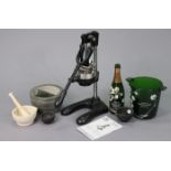 An Olympia black cast-iron juice extractor; a Perrier Jouet green glass ice bucket & ditto champagne
