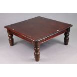 A mahogany coffee table (converted from an antique dining table), with rounded corners & moulded
