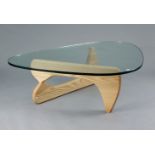 A NOGUCHI COFFEE TABLE, designed by Isamu Noguchi, probably by Vitra, with thick tempered glass top