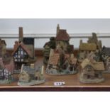 Eighteen various David Winter model houses, cottages, etc. including “Crofters Cottage”, “Toll