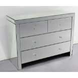 A mirrored dwarf chest fitted two short & two long drawers with faceted knob handles, 39¼” wide x