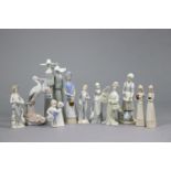 A Lladro porcelain ornament in the form of two standing nuns, 13” high; a Lladro Daisa porcelain