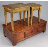 A teak rectangular low coffee table fitted three frieze drawers, 47” wide x 15” high x 23½”