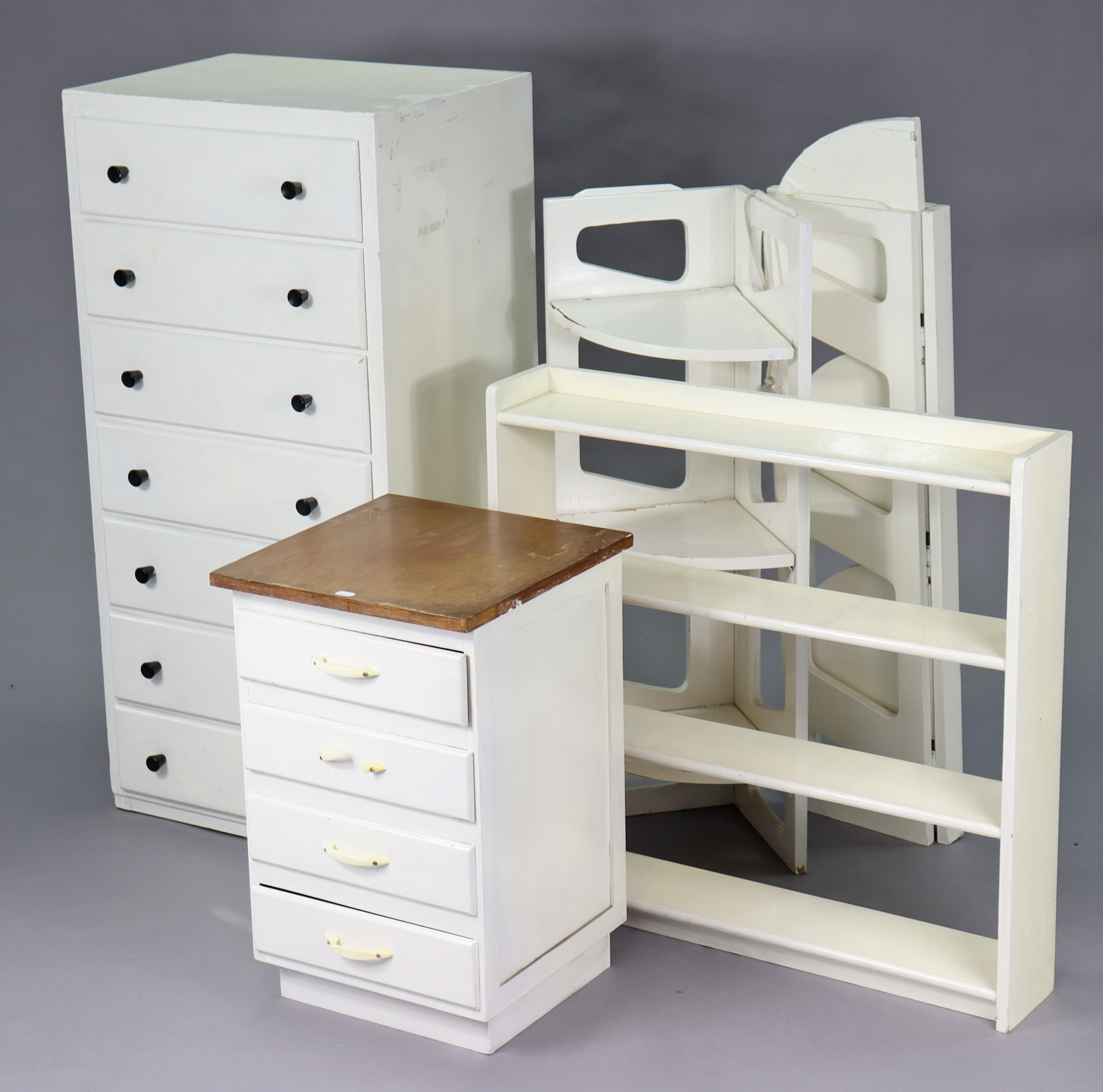 A white painted wooden small upright chest fitted seven long drawers, 28¼” wide x 43” high; together