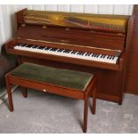 A Yamaha iron-framed & overstrung upright piano (No 2116592) in a mahogany case, 56” long x 44¾”