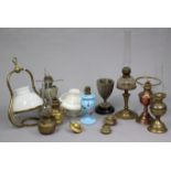A collection of eight various vintage oil lamps, and various oil lamp accessories.