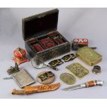 A Princess Mary’s 1914 Christmas tin (lacking contents); a bowie knife; a painted cast-iron “