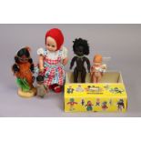 A Tiny Tears doll (No 160); together with four other dolls; & a Pelham Puppets box.