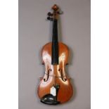 A violin, 22¼” long (w.a.f).