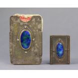 An arts & crafts-style plated playing-card case inset blue & green enamelled oval panel, 2¾” wide; &