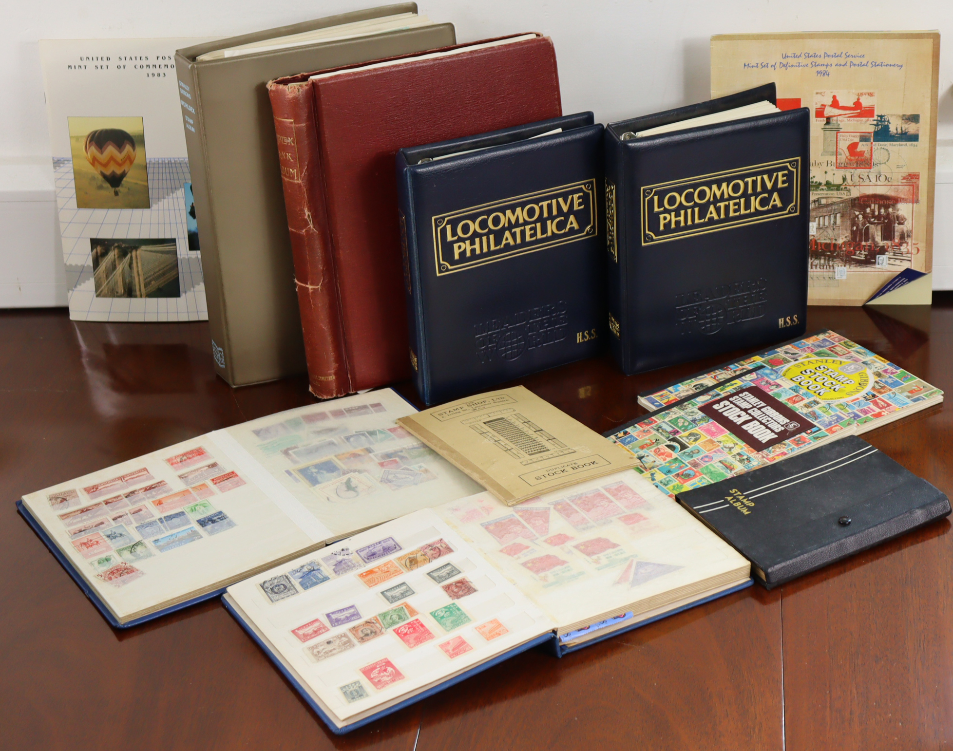 A collection of foreign stamps in various albums, on loose stock-back leaves, & loose in envelopes.
