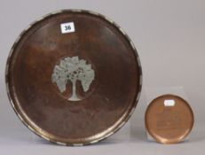 A Newlyn copper dish inscribed “Barnstaple”, 4½” diameter; & a copper & silvered-metal tray with