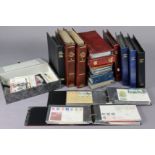 A collection of British commonwealth stamps in a ring-binder album; two albums of world stamps;