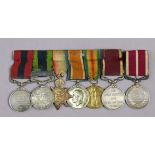 A DISTINGUISED CONDUCT MEDAL GROUP OF SEVEN awarded to J. Hughes, R.F.A/R.A/R.A.S.C; six mounted for