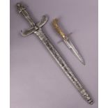 A vintage dagger with a 6¾” long double-edged blade, & with a stag-horn handle, 10¾” long; & a