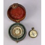 A WWI pilots pocket compass in a leather outer case; together with another compass in brass case.