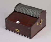 A late 19th/early 20th century mahogany sloping-front writing box enclosed by a tambour-shutter &