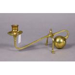 A Benson’s arts & crafts style brass counterbalance candlestick, 12” wide x 5” high.