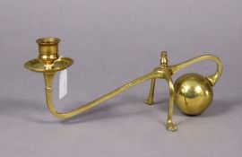 A Benson’s arts & crafts style brass counterbalance candlestick, 12” wide x 5” high.