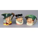 Three Royal Doulton large character jugs, “Beefeaters”, “Pied Piper”, & “The Cavalier”.