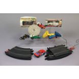 Five Scalextric model racing cars; & various other Scalextric accessories.