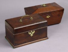 An early 19th century mahogany work box with brass swing handle to the hinged lid, brass shaped