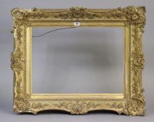 A 19th Century gilt-gesso rectangular picture frame with a raised foliate border 23” x 17” (internal