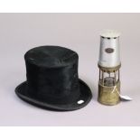 A Cadison brass & steel miners’ lamp, 10½” high; & a F. W. Fardells of Stratford black silk
