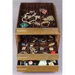 A ditto counter-top chest containing various items of costume jewellery.