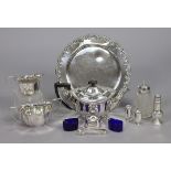 Four various silver condiments; a silver-plated three-piece tea service; & various other items of