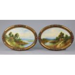 A pair of oval oil paintings each depicting a river landscape, 13½” x 19½”, in matching barbola-type