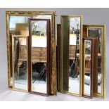 A large rectangular gilt frame wall mirror inset with a bevelled plate, 44” x 34”; together with